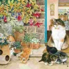 Puzzle Agneatha e os seus gatinhos na soleira da porta