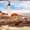 Puzzle Farol entre rochas